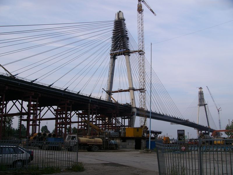 Фотографии -> Санкт-Петербург ->  Строящийся вантовый мост через Неву -> Строящийся вантовый мост через Неву - Вид с левого берега на 27.07.2004